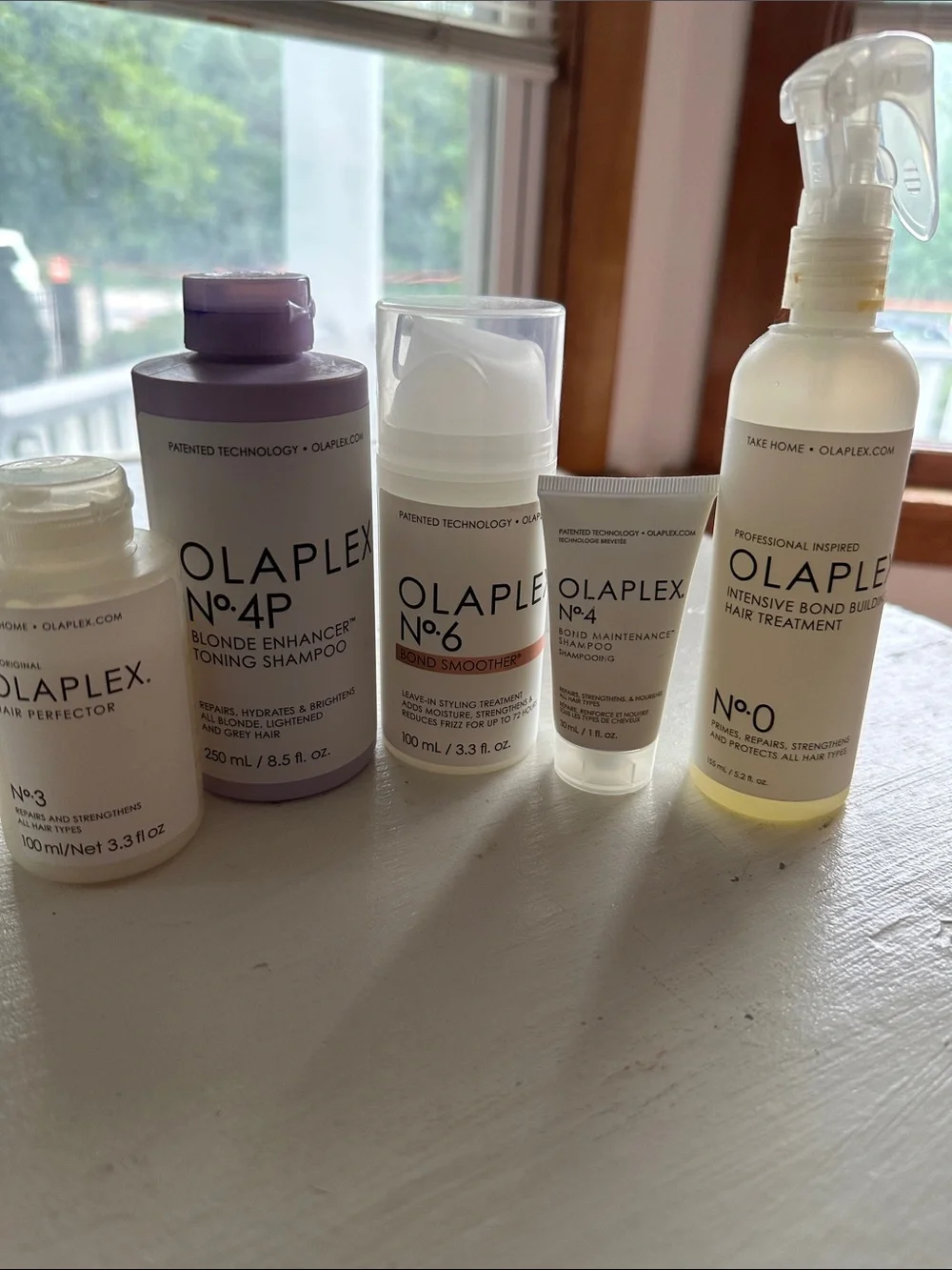 OLAPLEX Hair Care Set in Lavender, White, Clear